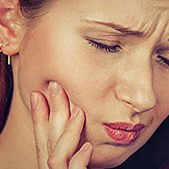 Woman with tooth pain